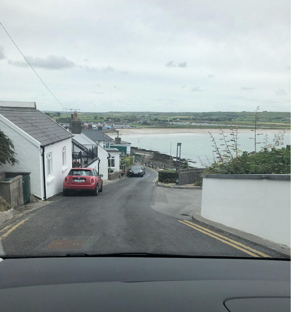 A picture of driving near a cliff in Ireland